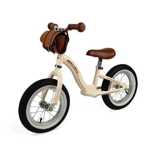 draisienne vintage en métal beige pour enfant